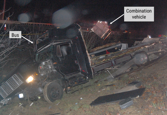 ​​​Eastbound view of final rest positions of the bus and combination vehicle (Source: Virginia State Police with annotations by the NTSB)